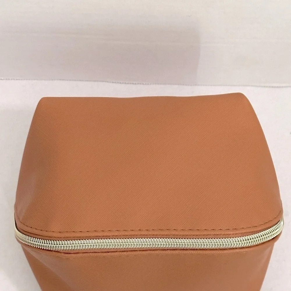 Moroccan oil Tan travel Bag from recycled materials NWOT